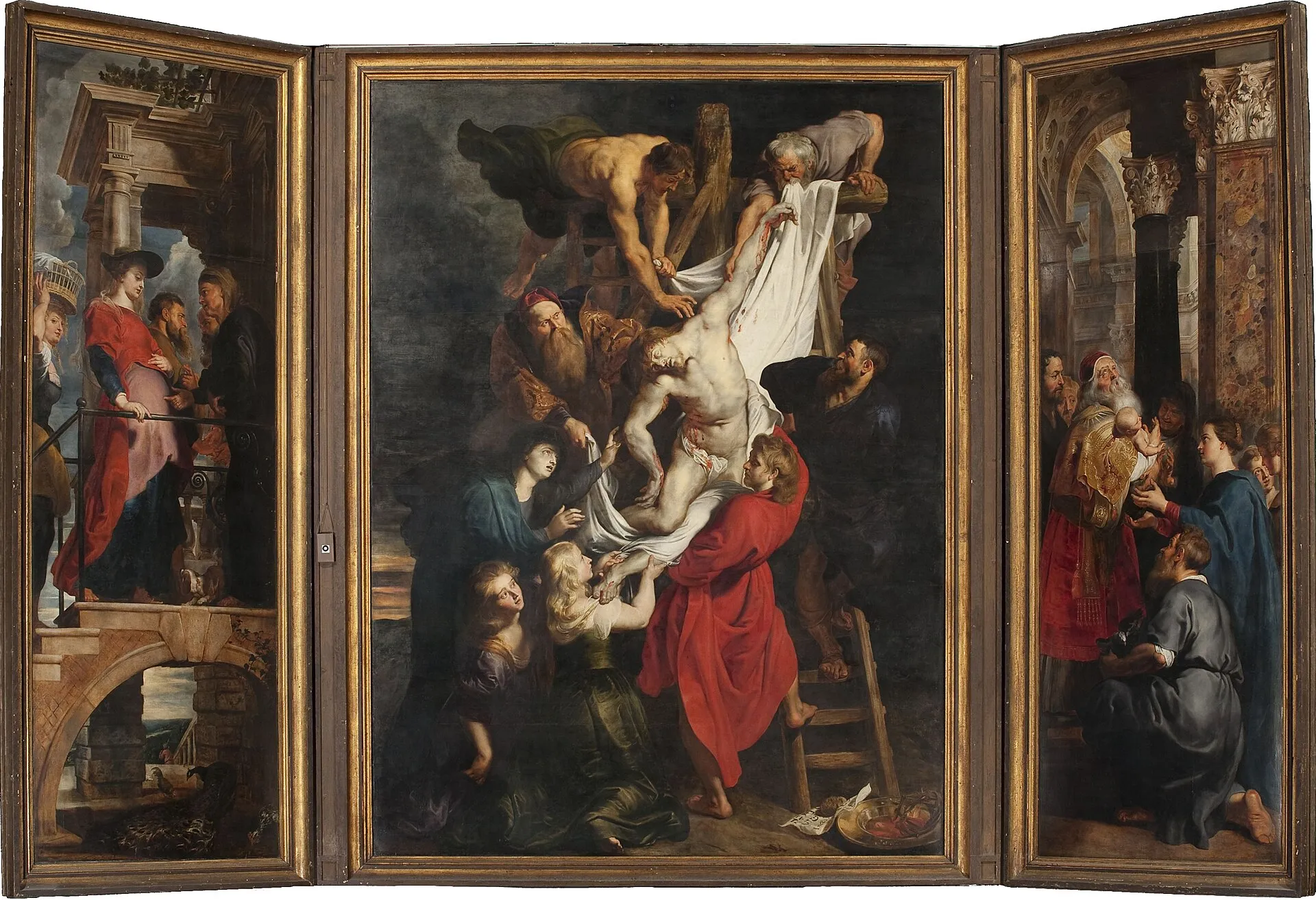 The central panel of the triptych, with Christ's body lowered onto a white sheet.