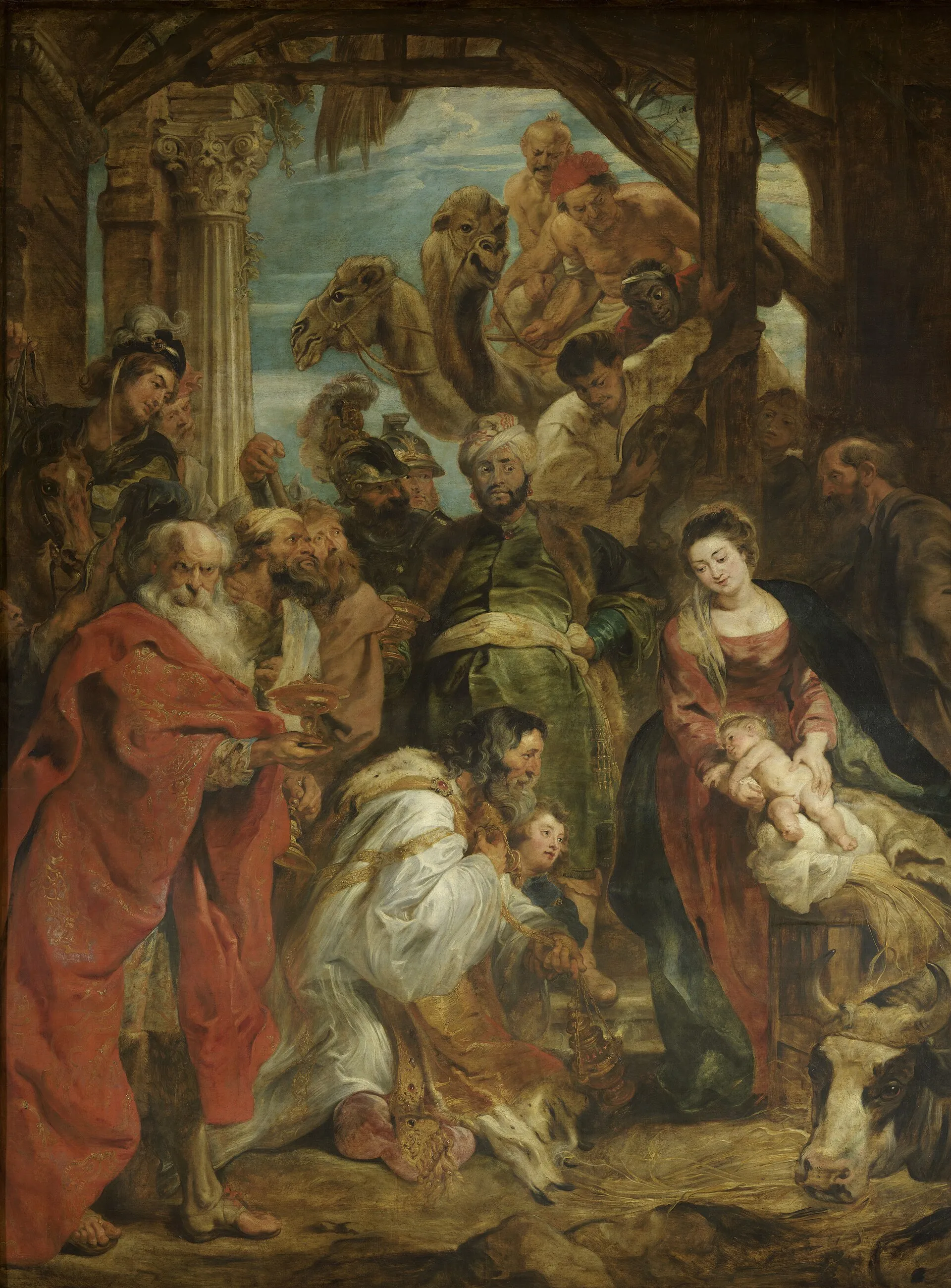 The Magi and their retinue crowded around the manger.