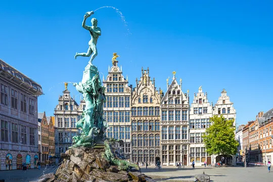 The Brabo fountain on Antwerp's Grote Markt, in front of the stepped gables of the guild houses.